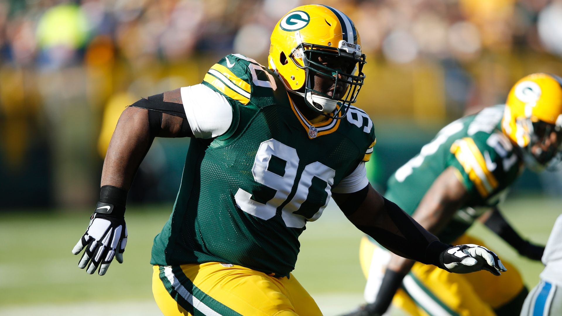 Packers Lineman Raji Secures Win With Interception - The New York Times