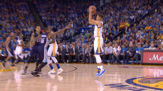 Curry hits one from just inside the logo