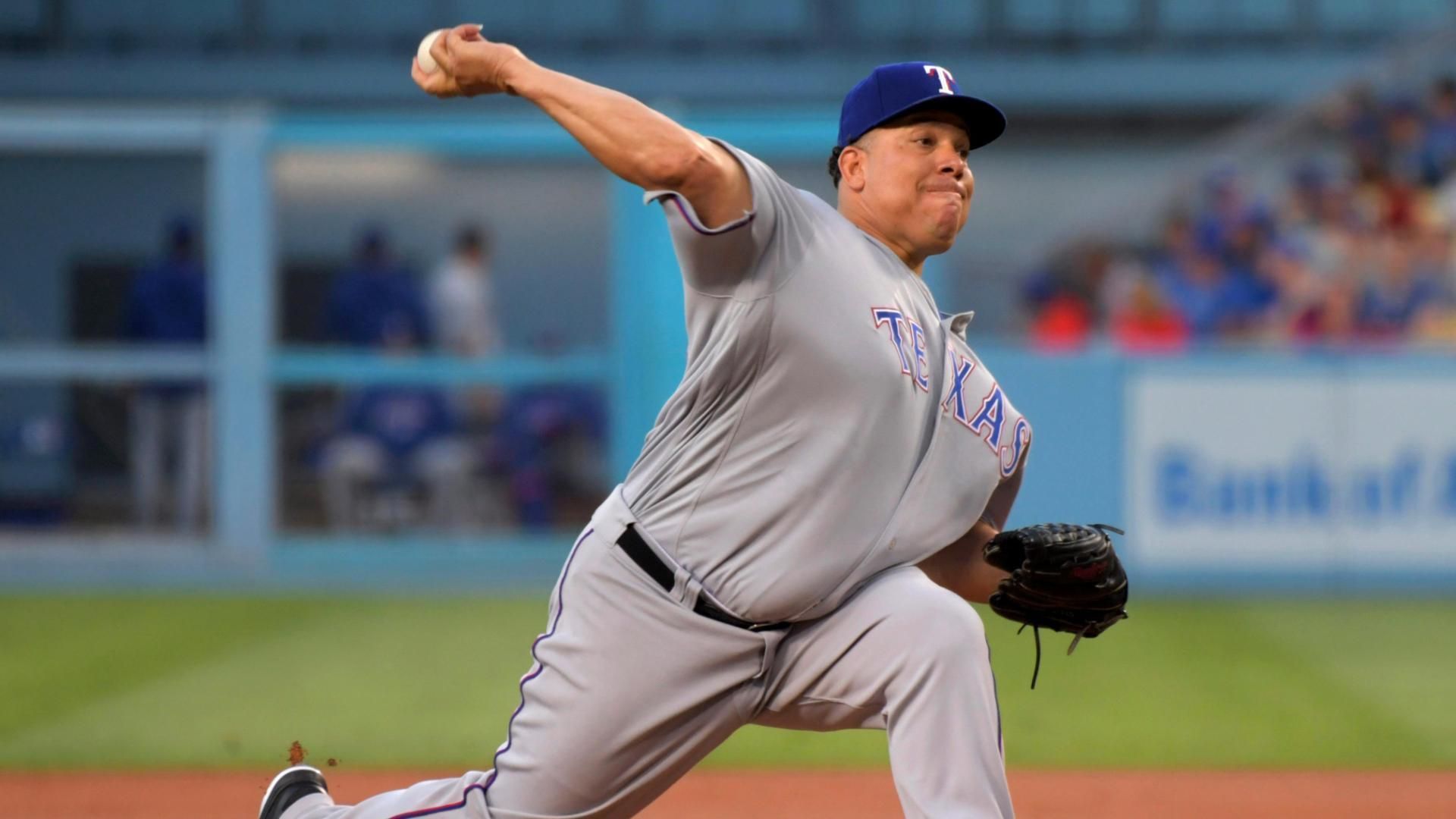 Ageless Colon gets his first win for Rangers