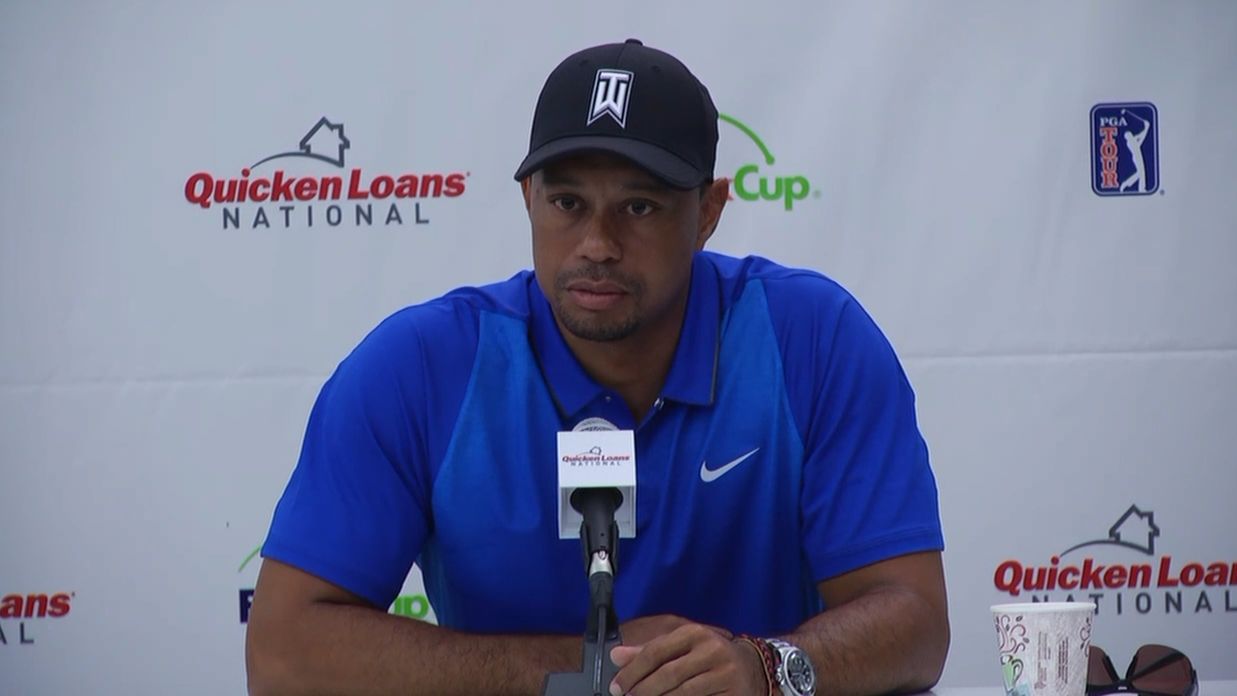 Tiger anguishes watching from sidelines