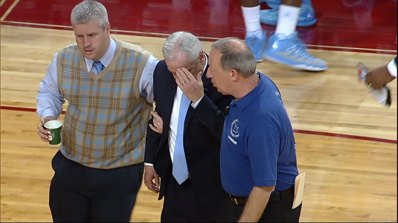 Roy Williams collapses in the huddle