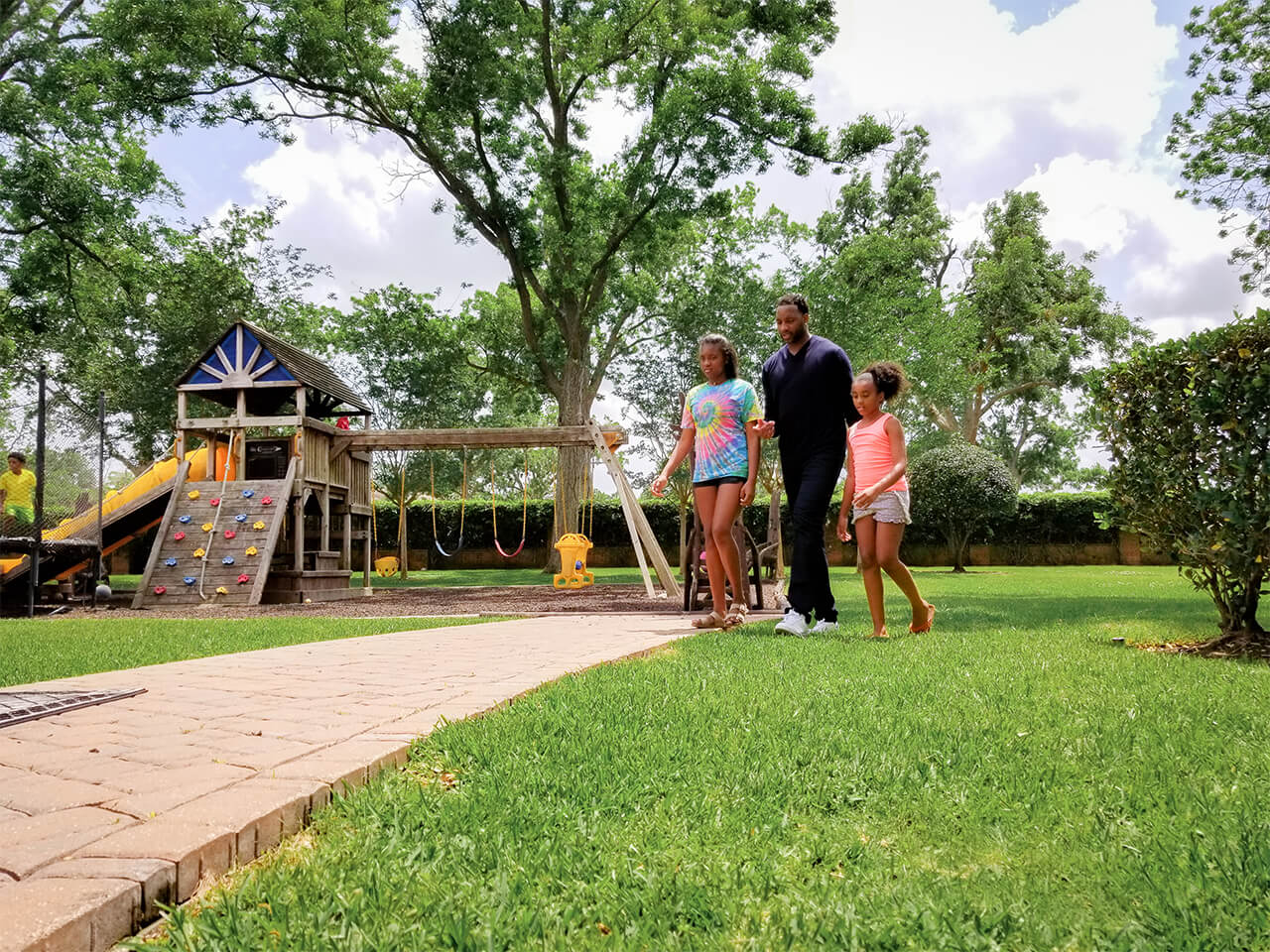 Houston, TX: Family firstâ€¦The McGrady family playing in the back yard of their home. - Captured on a Samsung Galaxy S8